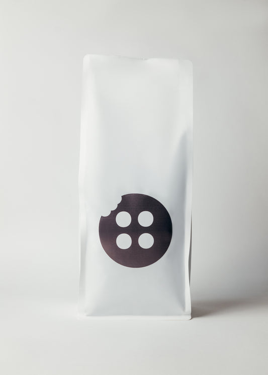 White package with a black logo on a white background